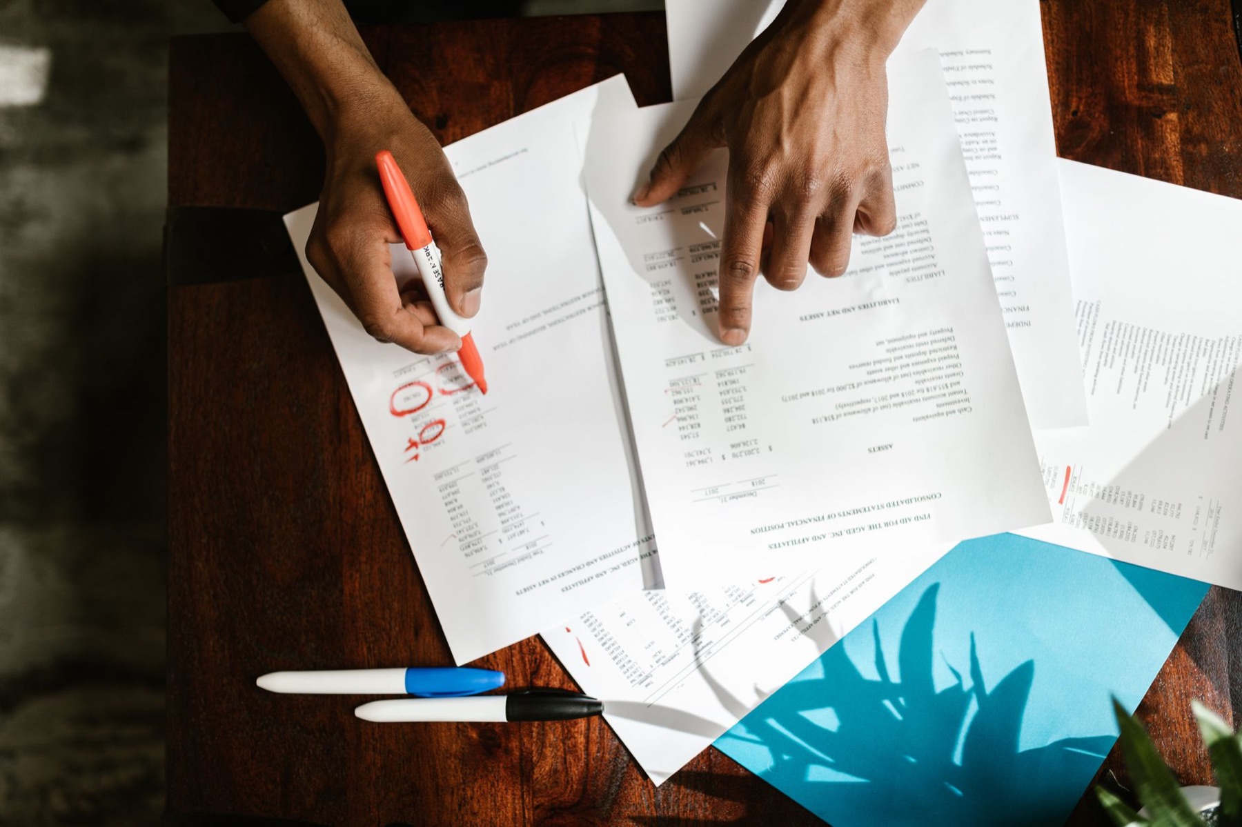 Reviewing corporate records and financial paperwork