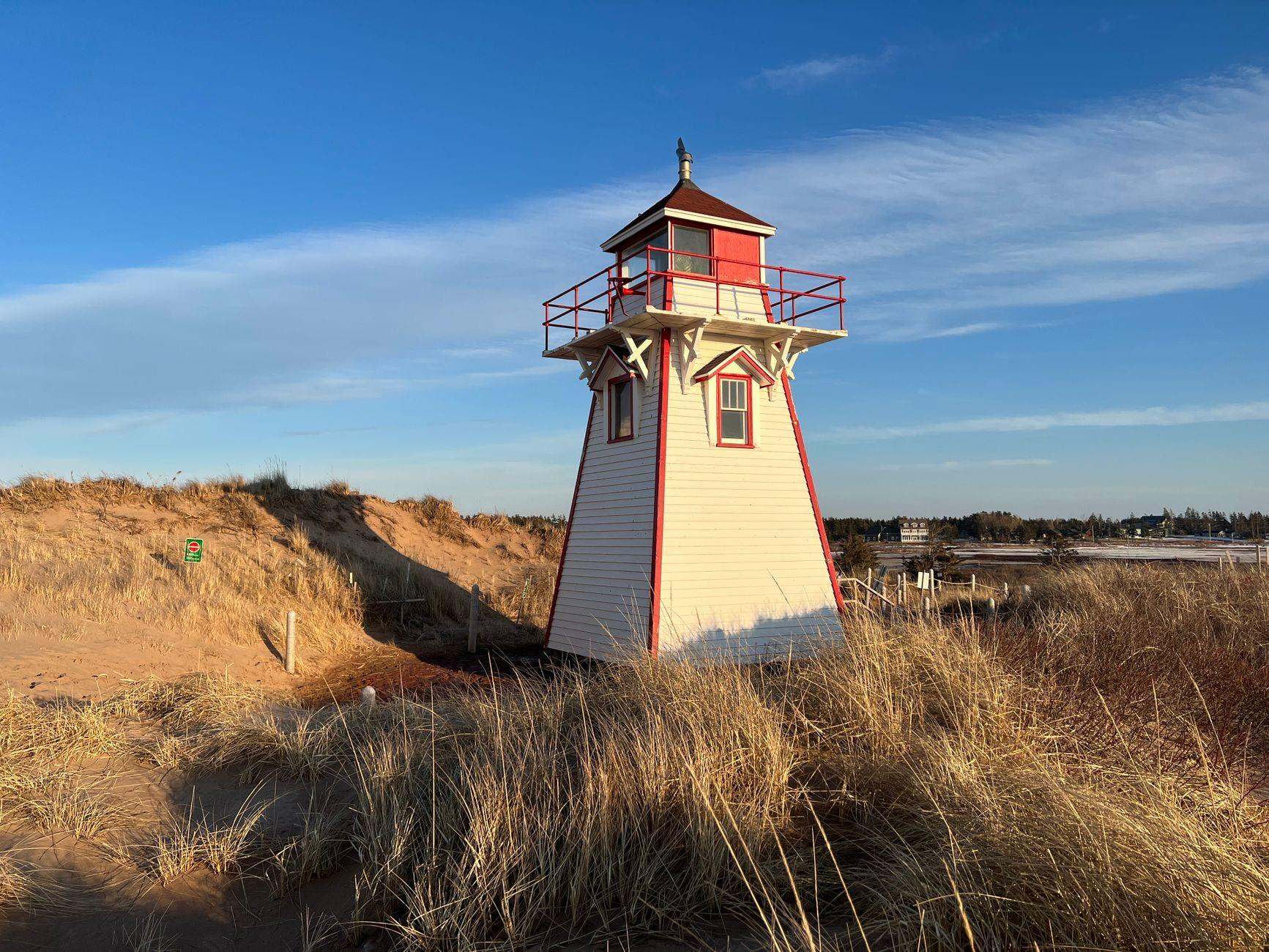 Covehead Harbour Lighthouse and sand dunes on Prince Edward Island