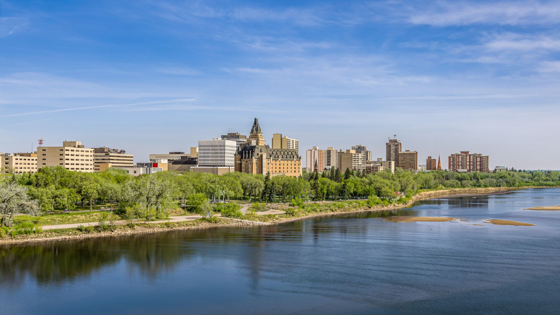 Saskatoon skyline and riverbank in spring